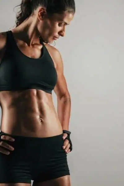 Toning Up at Home: The Ultimate Guide to Bodyweight Exercises 2 Image of woman's toned stomach after bodyweight exercises Oxted and non-surgical treatment from Lipo 360