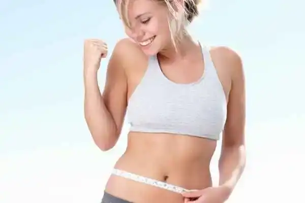 Unraveling the Mystery: Where Does the Body Fat Loss From First? 3 Image of woman happy with fat loss Oxted