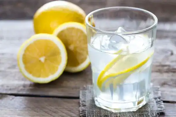 Hydration: The Secret Ingredient for a Toned Stomach and Enhanced Fitness 2 Image of lemon water to aid hydration Oxted