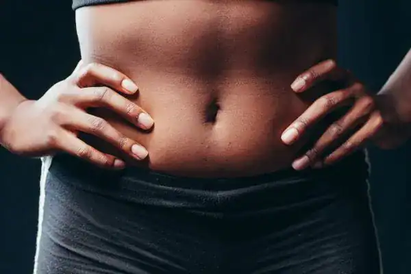 Toning Your Stomach: The Ultimate Guide to Achieving a Sculpted Stomach While Shedding Pounds 1 Image of a toned stomach after non surgical treatment Oxted